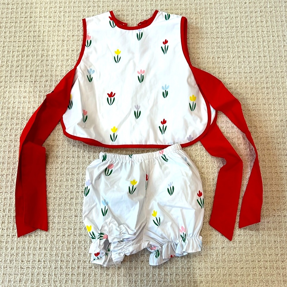The Beaufort Bonnet apron top with bloomers. Size 2T. Floral pattern. Red